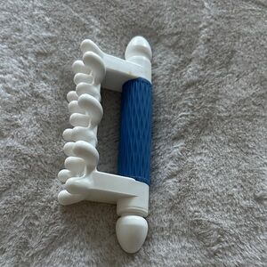 White and Blue Handheld Massager